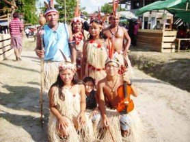 This Orealla family walked around the village on Friday playing their instruments and singing as heritage day was celebrated. (See page three) (Sara Bharrat photo) 