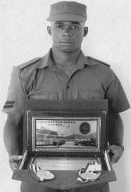 Corporal Aluko Venture displays the diploma he gained in martial arts.
