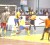 Camptown’s Norris Carter, at right, catches Mahaica Determinators’ custodian (wearing No. 1) off guard and fires one into the back of the net while being marked by a few defenders in their first knockout match at the Cliff Anderson Sports Hall on Monday night. (Orlando Charles photo) 