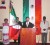 Ambassador of Mexico Fernando Sandoval Flores giving the cry of independence. Looking on at right is Prime Minister Sam Hinds. 