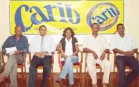 From left, Director of Sport Neil Kumar, Minister of Sport Dr. Frank Anthony, Ansa McAl Marketing Assistant Darshnie Yusuf, GSL’s Vice Chairman Halim Khan and Organizing Secretary of the GSL Leonard Harprashad at yesterday launching of the GSL Carib Beer national tournament    