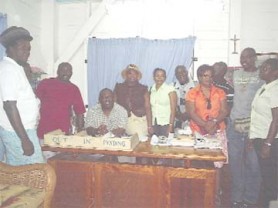 Clerk of Markets, Schulder Griffith (sitting) surrounded by vendors, who are part of the Management Committee for the Mall and part of the Organising Committee for the formal opening ceremony of the facility which will take place on October 3. 