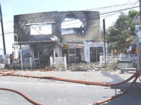 The building completely destroyed by fire