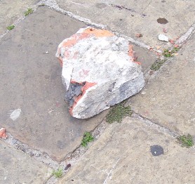 The brick which was allegedly used to strike Hinds