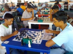 Kana Khan and Rashad Hussein concentrate on their game in the Junior segment of the tournament.