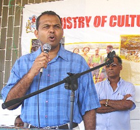 Minister of Culture, Youth and Sport Dr. Frank Anthony addresses the Better Hope community on Sunday’s Day of Interaction for villages along the east coast. 