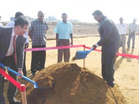 Japanese Counsellor Kiyoshi Takeuchi (left) and Minister of Water Irfaan Ali turning the sod while GWI and other officials look on. (Photo courtesy of GWI)