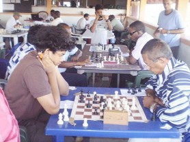 Taffin Khan, left and Errol Tiwari  during their sixth round clash. 