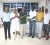 Stabroek News’ Sports Editor Donald Duff, third from right, hands over the first place trophy to Andre Cummings winner of the inaugural de Caires/Mackie Memorial golf tournament which took place yesterday at the Lusignan Golf Club course. Others in photo are from left, Ronald Bulkan, secretary of the LGC, Dr Cecil Ramsingh, second place finisher, William Walker who placed third and Club Captain Jerome Khan.(Orlando Charles photo.)    