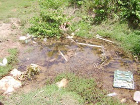 The source of the problem - the broken water main is sunk in this hole which was created by a contractor. 