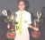This year’s top CSEC performer, Kia Persaud poses with three trophies awarded her at yesterday’s ceremony. 