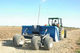 The laser land leveller and tractor (GINA photo)