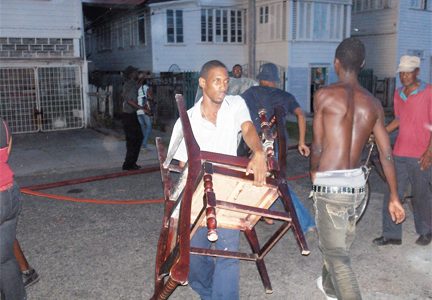 As the fire spread on Regent Street, residents on Charlotte Street (south of Regent St) began moving furniture, equipment and other valuables from their homes. (Mark McGowan photo)