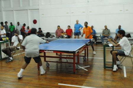 Action in the Kenneth De Abreu league table tennis tournament which got underway on Saturday at the Malteenoes Sports Club. (Aubrey Crawford photo)