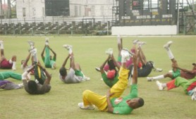 The Guyana players go through their paces at the GCC ground yesterday. The squad is currently preparing for the WICB President’s Cup tournament.   