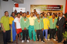 The West Indies U-19 team members seen here with representatives of the TCL Group following their selection at the conclusion of the 2009 TCL Group W.I. U-19 Cricket Challenge in Jamaica.  