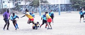 The Guyana women’s rugby team in action at a practice match held at the National Park. (Aubrey Crawford photo) 