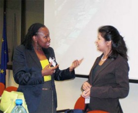 Former CNN news anchor Tumi Makgabo (left) chats with Trinidadian media consultant Dr Krishendaye Rampersaud.  