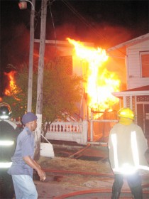 The home at Garnett Street, Newtown, Kitty ablaze on Sunday night. (Photo by Brenon Sookram)