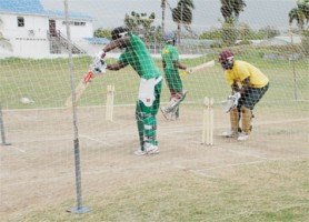 The Guyana  team undergoing its final net session yesterday at the Malteenoes Sports Club ground prior to today’s opening game against the Leeward Islands at the Enmore Community Development Centre ground. (Aubrey Crawford photo)