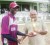 Well played! Man-of the match Akeem Dewar receives his trophy from GCB Vice President Fizul Bacchus for his figures of three wickets for 24 runs against Barbados. (Rawle Toney Photo)  