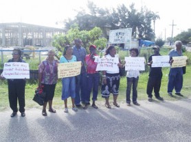 Some of the picketers gathered at the corners of Camp and Young streets yesterday afternoon.
