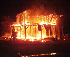This house at Lot 13, Great Diamond Squatting Area was completely  destroyed by fire on Saturday night shortly after 9 pm following  a dispute between the occupants of the house. The owner of the house declined to comment when approached by Stabroek News yesterday, only stating that  the house, which does not receive electricity, was set alight following ‘an accident’. 