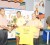Sport Minister Dr. Frank Anthony presents the championship trophy to Geron Williams while Junior Minister of Health Dr. Bheri Ramsarran displays the winning yellow jersey. (Aubrey Crawford photo) 