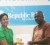 Sales Executive of Caribbean Airlines, Kathleen Shuffler-Ten Pow (left) presents two Caribbean Airline tickets to grand prize winner Norvell Fredericks.    