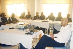 Local referees were caught in this Orlando Charles photo paying keen attention to a video simulation carried out by FIFA Referee Instructor - Peter Prendergast of Jamaica at Wednesday’s opening session  at Zoom Inn Hotel. 
