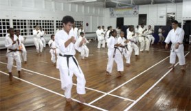 Students of the GKC perform a new technique in Kata under the tutelage of Chief Instructor Master Frank Woon-A-Tai.