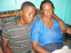 Beverly, wife of the late Gary McAlmont, with her son Gevon yesterday