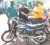 Supervisor of R&F Mining Christopher Cobral (centre) hands over the keys to the MVP Motorcycle to Kashif Muhammad (right) while Aubrey ‘Shanghai’ Major (left) looks on. 