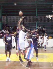 Part of the action between Pepsi Sonics and Demerara Colours Panthers last Thursday at the Cliff Anderson Sports hall. (Orlando Charles Photo)