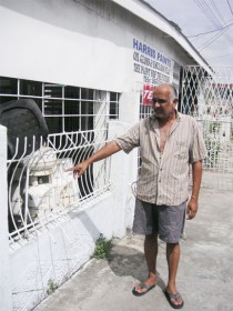 Roopnarine pointing to the grill which the intruders “nipped” to steal his gas bottles