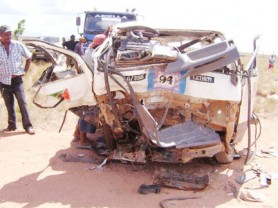 The smashed mini-bus following the accident. 