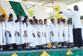 The National Schools’ Choir performing a National Song at the National Park yesterday