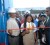 Prime Minister Samuel Hinds (left) and President Bharrat Jagdeo (right) look on as a Queen’s College student cuts the ribbon officially declaring the new GPL Kingston Power Plant open.