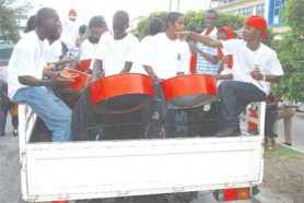 Steelband players livened up the Fogarty’s Santa parade on Saturday.