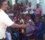 Latchmin Punalall MP distributing toys in Linden (AFC photo)