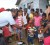 President Jagdeo distributing gifts to children in Sophia on Christmas morning (GINA)