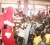 Santa received an enthusiastic welcome at the annual Dharm Shala Christmas party for children recently. (Photo by Orlando Charles)   
