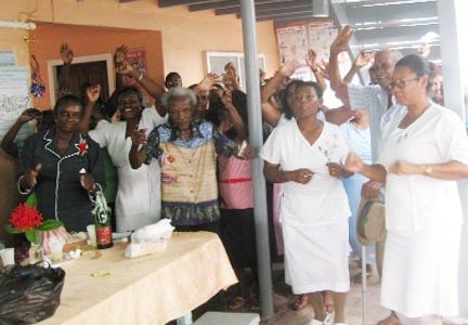 The Regional Health Department of Region Five hosted a party for senior citizens at the Woodley Park Health Centre last week. In photo, Regional Health Officer, Venus Smartt (left) and nurses dance with some of the elderly folk. 