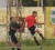 Part of the action between defending champions Linden Foundation Secondary (player left) and an All-Star 11 at the opening of the second annual Edward ‘Screw’ Richmond under-18 football tournament. 