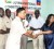 Chairperson of the National Committee for Haiti Disaster Relief, Priya Manickchand receives a cheque from Assistant Police Commissioner, Krishna Lekraj. (GINA photo)