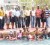 Teachers and volunteers along with coordinator Wilton Spencer (at left) pose after their first training session at the Colgrain Pool. The children were a part of another programme. (Orlando Charles photo)  