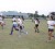 The women’s hockey squad undergoing a fitness training session yesterday at the Georgetown  Cricket Club ground. (Orlando Charles photo)