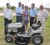 Mohamed Ally (second right) handing over the keys for the Craftsman Lawn Tractor to Imran Ally. Also in photo is Shaikh Moeen Hack (left) among others.     