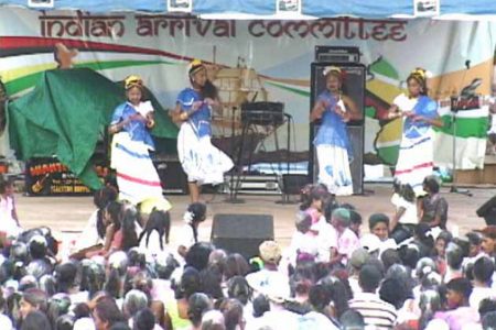 Dancers entertain the crowd at the Bath Settlement Community Centre Ground at the IAC’s annual Phagwah mela held on Monday. 