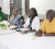 Jamaican Olympian Grace Jackson (second  from right) addresses a gathering of local athletes Thursday evening at the Thomas Lands YMCA building. Others in picture are from left, Dr. Karen Pilgrim, K. Juman Yassin and Claude Blackmore. (Orlando Charles photo)